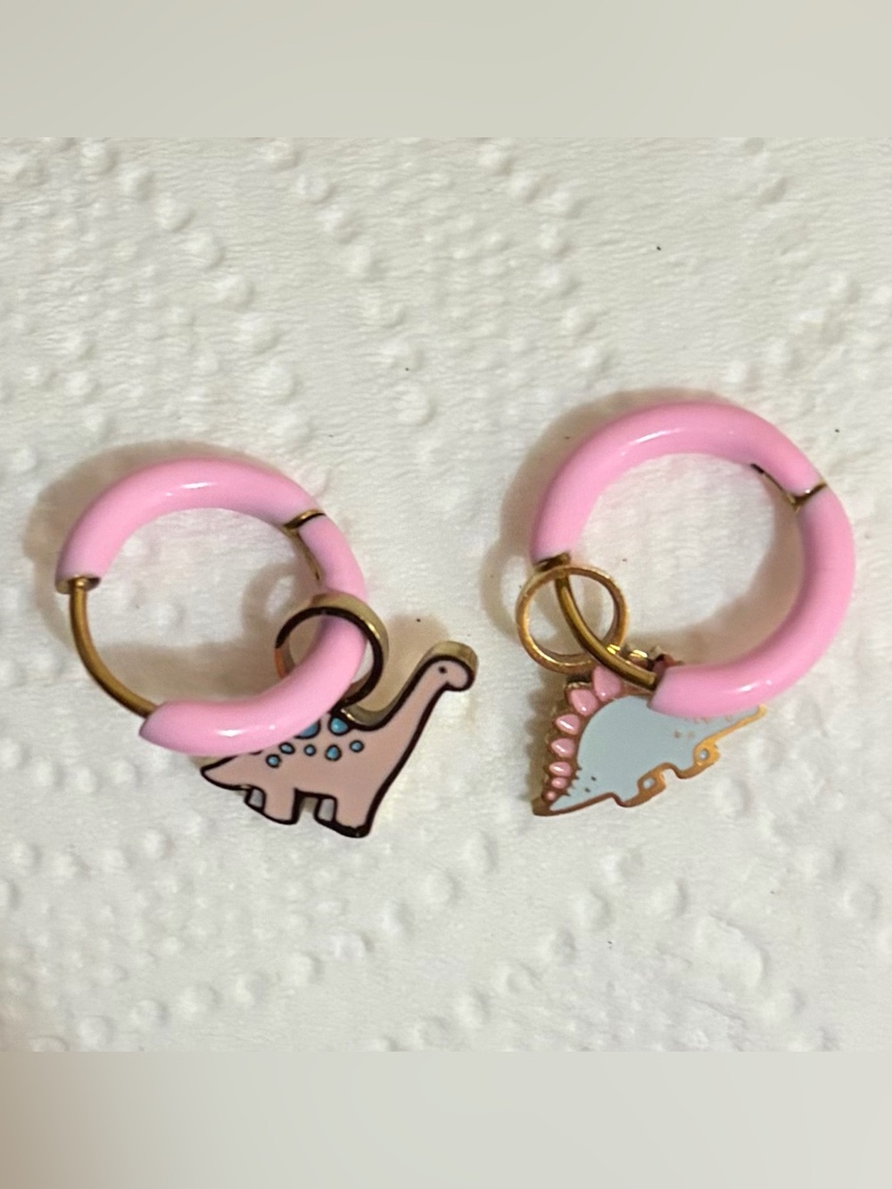 Pierced Co. Pink Hoop Earrings with mismatched Dinosaur charms
